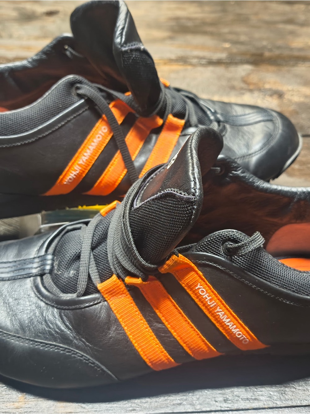 Yohji Yamamoto Black Sneakers with Bright Orange Stripes